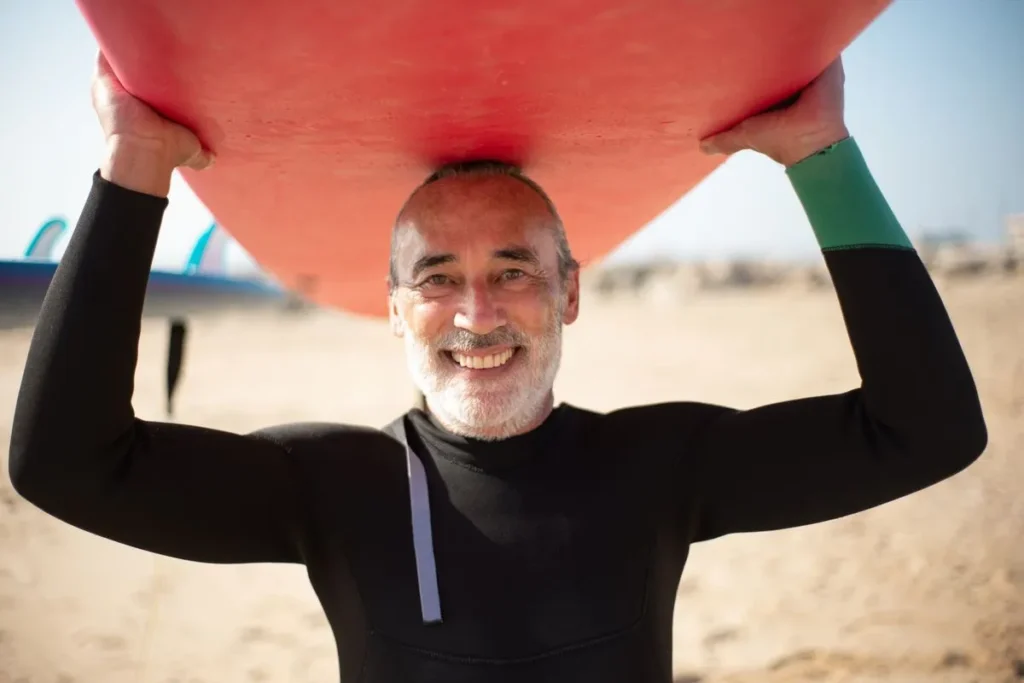 Smiling older surfer for men’s health compounding